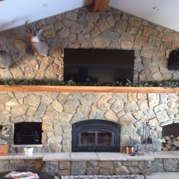 stone living room wall | Neiderquill Contracting Saginaw MI