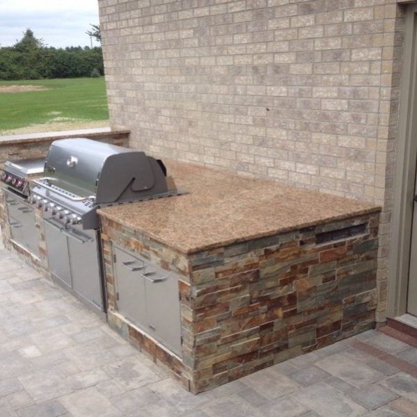 outdoor stone kitchen | Neiderquill Contracting Saginaw MI